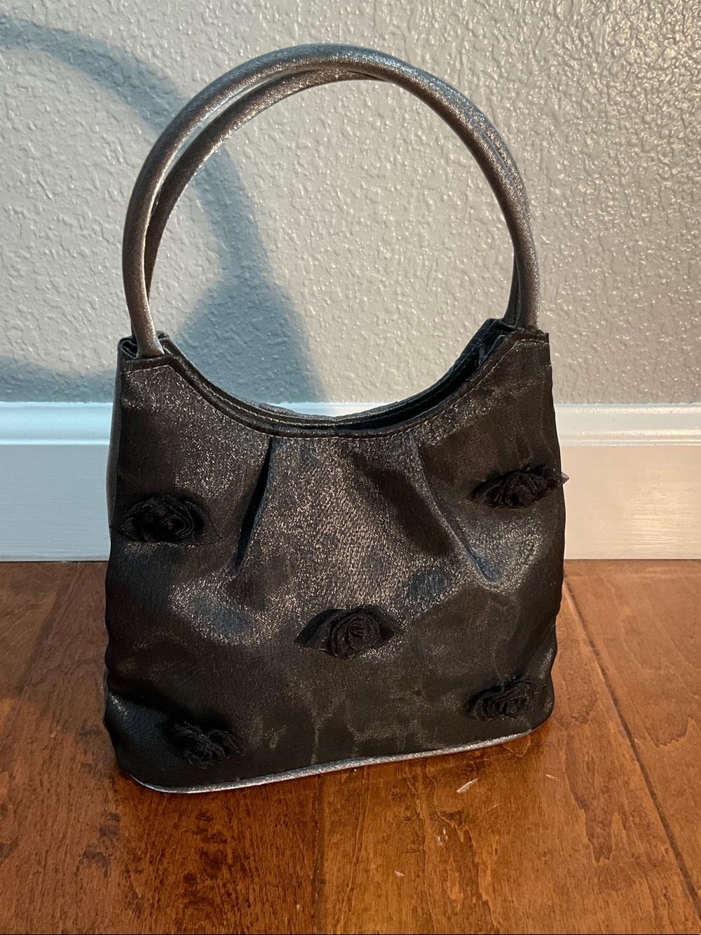 Elegant Black Satin Handbag with Rosette Accents - Picture 1 of 5